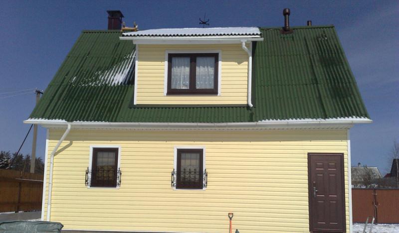 Дом в пос. Агалатово с сайдингом и водостоками