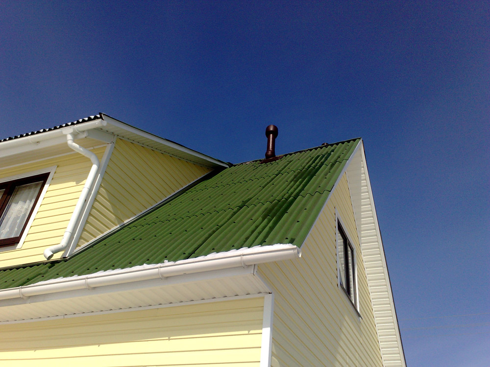 Дом в поселке Агалатово с сайдингом и водостоками