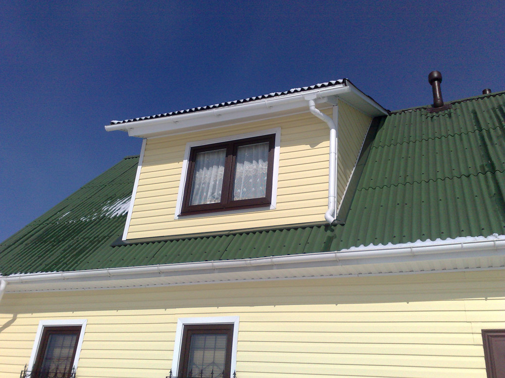 Дом в поселке Агалатово с сайдингом и водостоками Дом в поселке Агалатово с сайдингом и водостоками